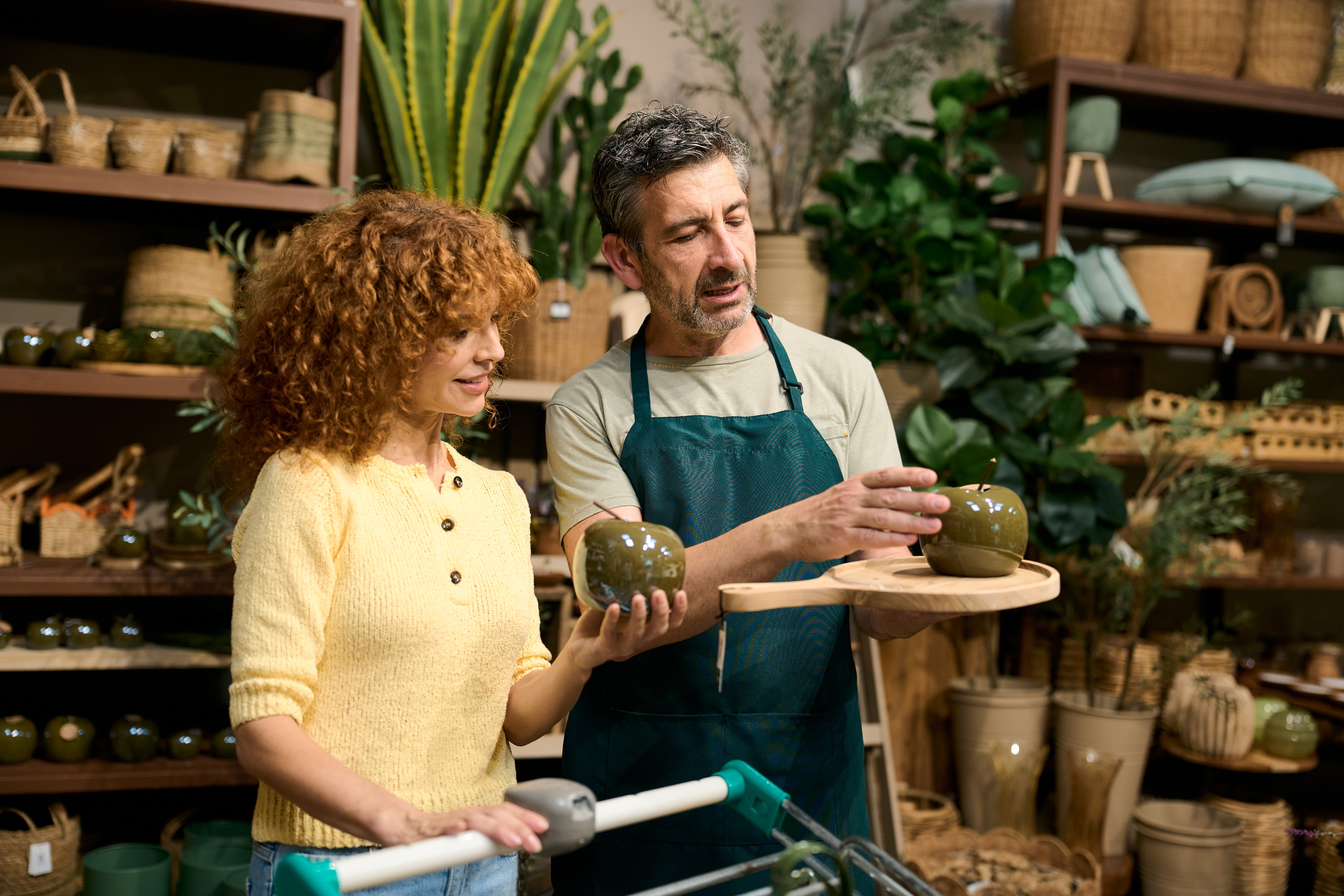 Two business owners discussing in their shop